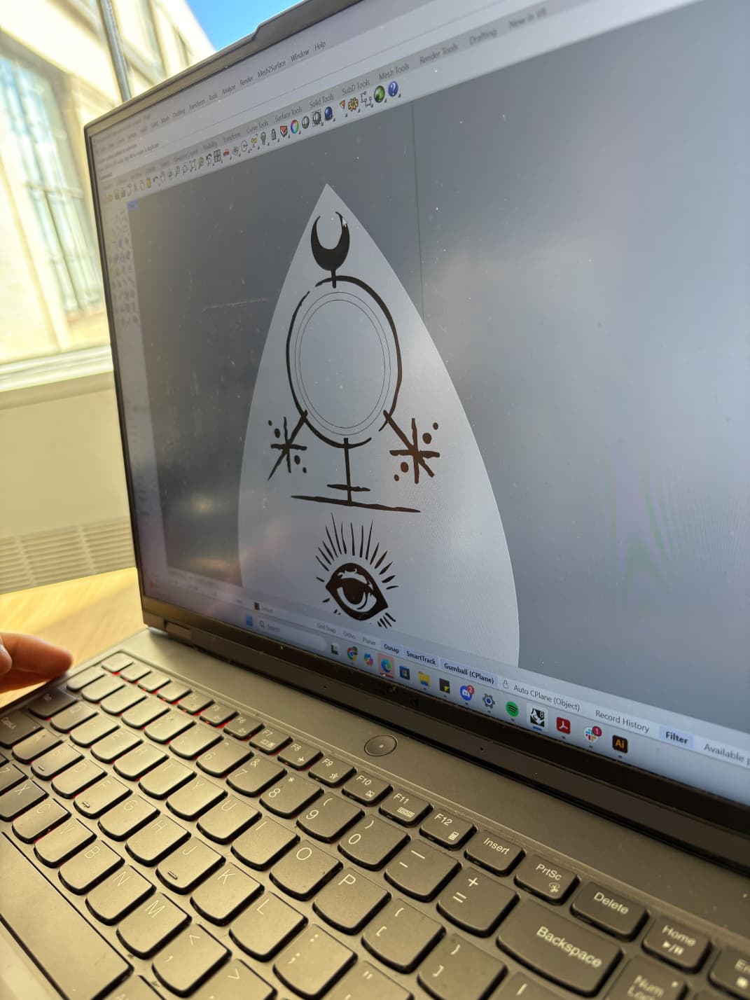 Rhino model of the Ouija cursor showing engraved symbols